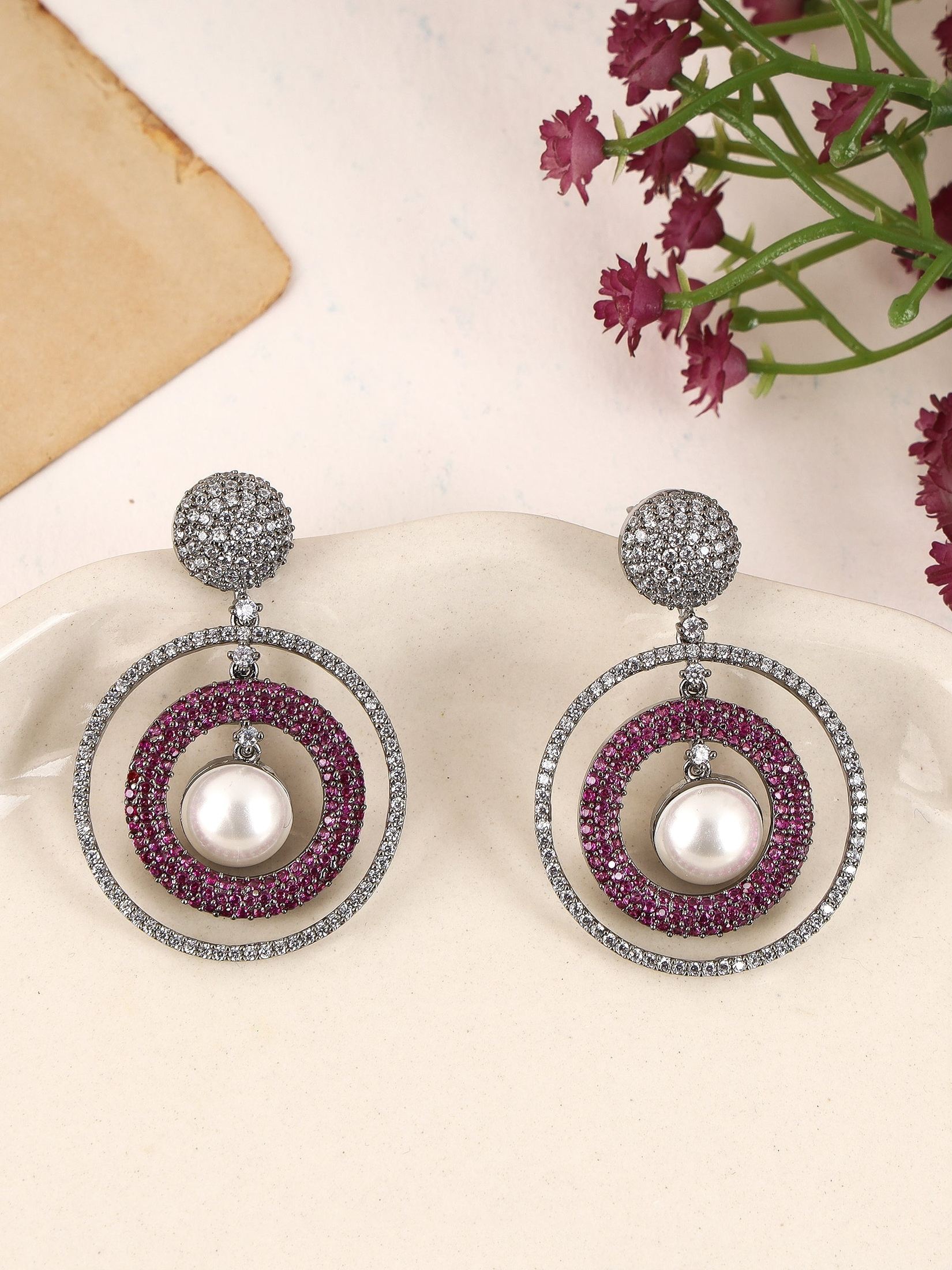 Concentric pearl and american diamond studded earring