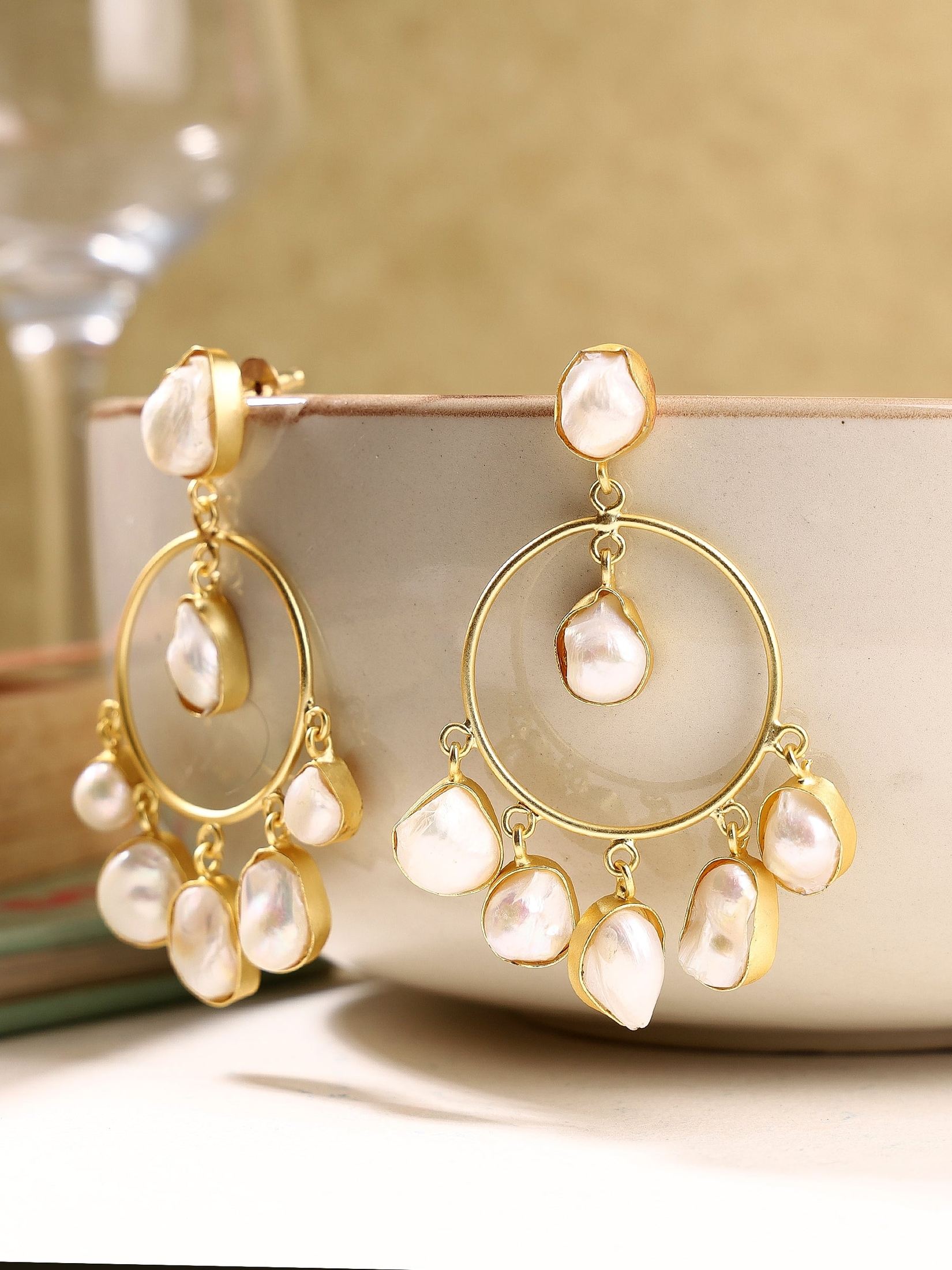 Dangling Pearl Earrings with Opulent Center Stone