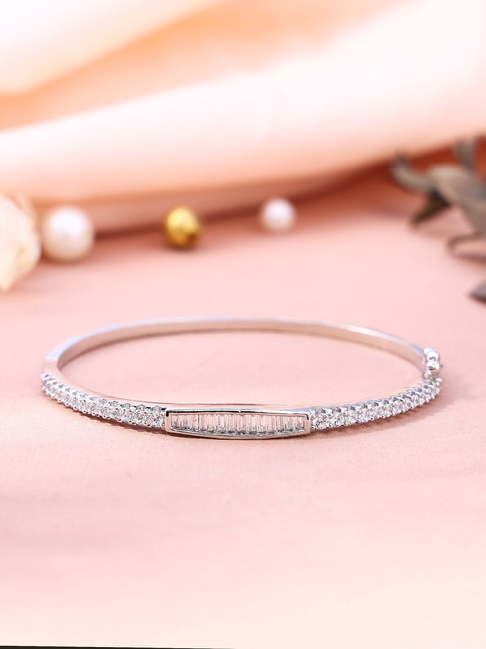 Sophisticated Rhodium Plated Bangle Bracelet with fancy cut baguette stone